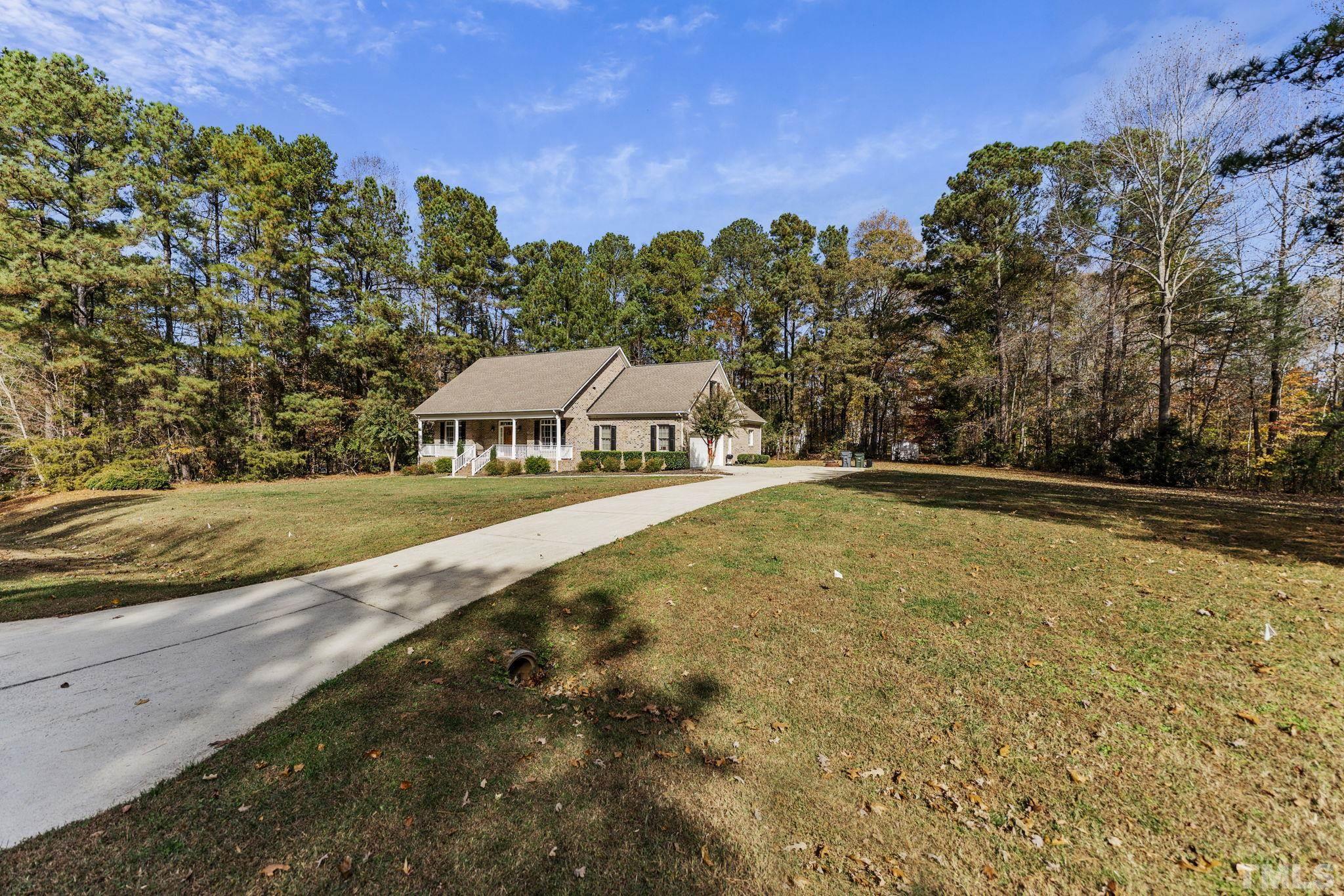 25 Eaglefeather Path Youngsville, NC 27596 - Photo 2 of 36 a view of a house with a yard