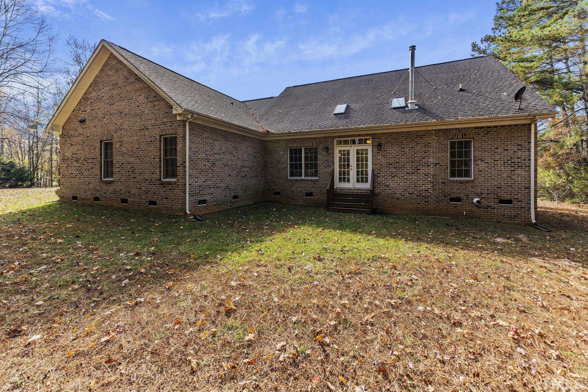 25 Eaglefeather Path Youngsville, NC 27596 - Photo 30 of 36 a view of a house with a yard