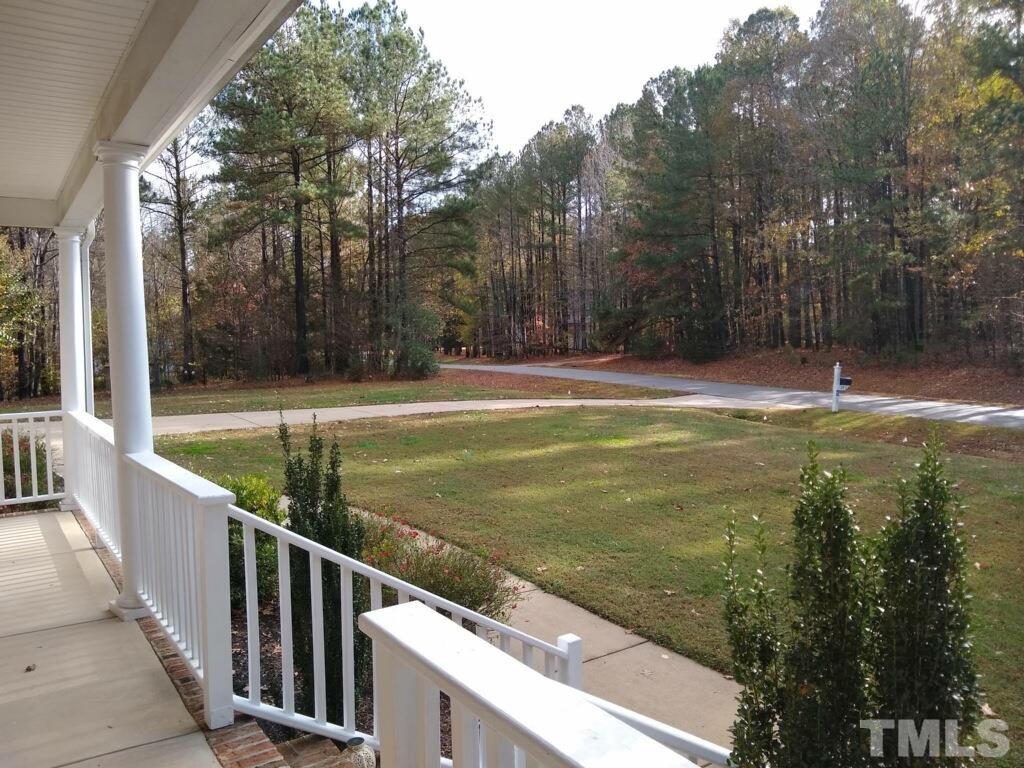 25 Eaglefeather Path Youngsville, NC 27596 - Photo 35 of 36 a view of a swimming pool with a yard