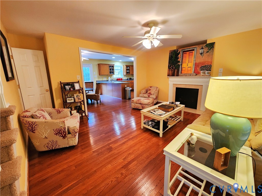 2744 Smokey Road Aylett, VA 23009 - Photo 4 of 72 Hardwood flooring, a ceiling fan, a fireplace with