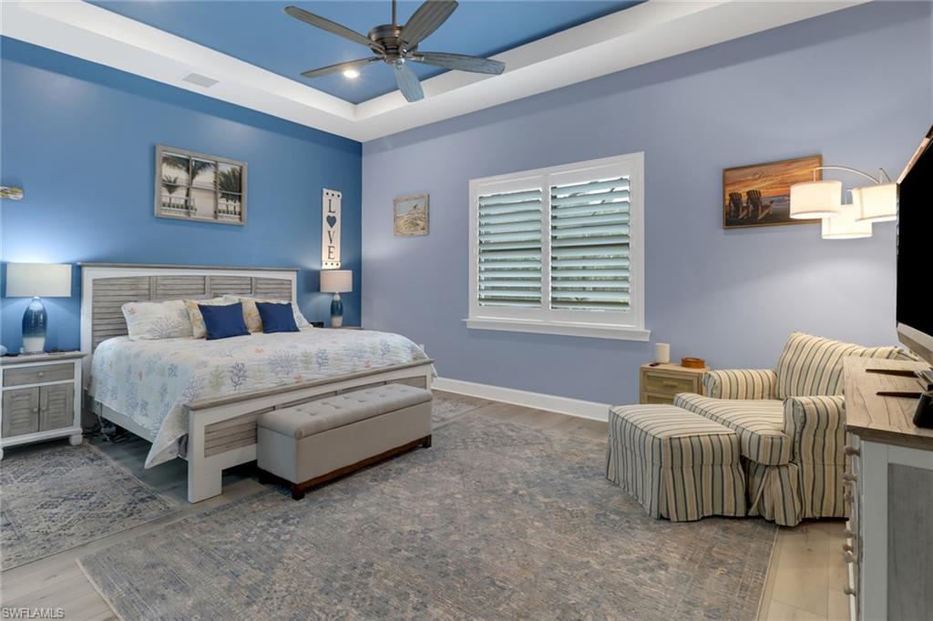 14236 Moonlit Way Estero, FL 33928 - Photo 14 of 46 a bedroom with a bed and window