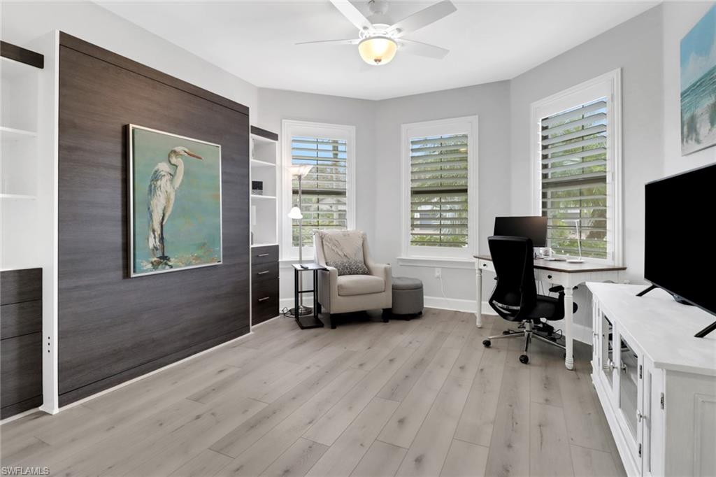 14236 Moonlit Way Estero, FL 33928 - Photo 19 of 46 a view of a livingroom with workspace and a window