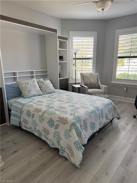 14236 Moonlit Way Estero, FL 33928 - Photo 20 of 46 a bedroom with bed and a window