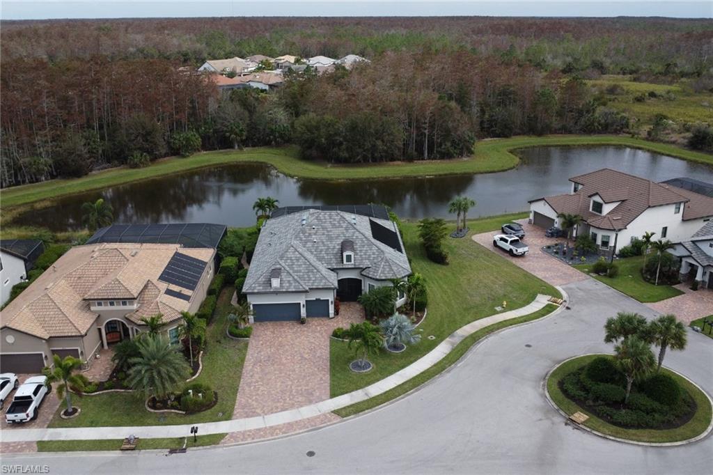 14236 Moonlit Way Estero, FL 33928 - Photo 34 of 46 an aerial view of a house with garden space and lake view