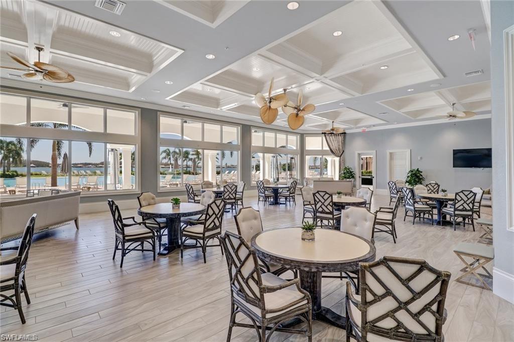 14236 Moonlit Way Estero, FL 33928 - Photo 41 of 46 a dining room with furniture window and wooden floor