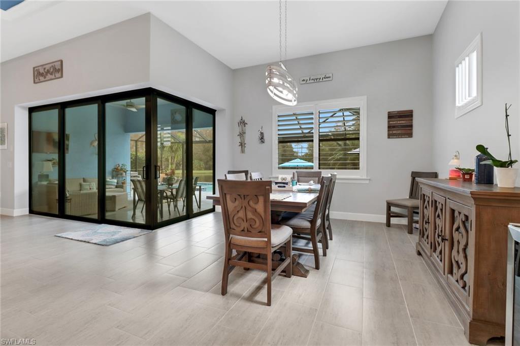 14236 Moonlit Way Estero, FL 33928 - Photo 9 of 46 a view of a dining room with furniture window and outside view