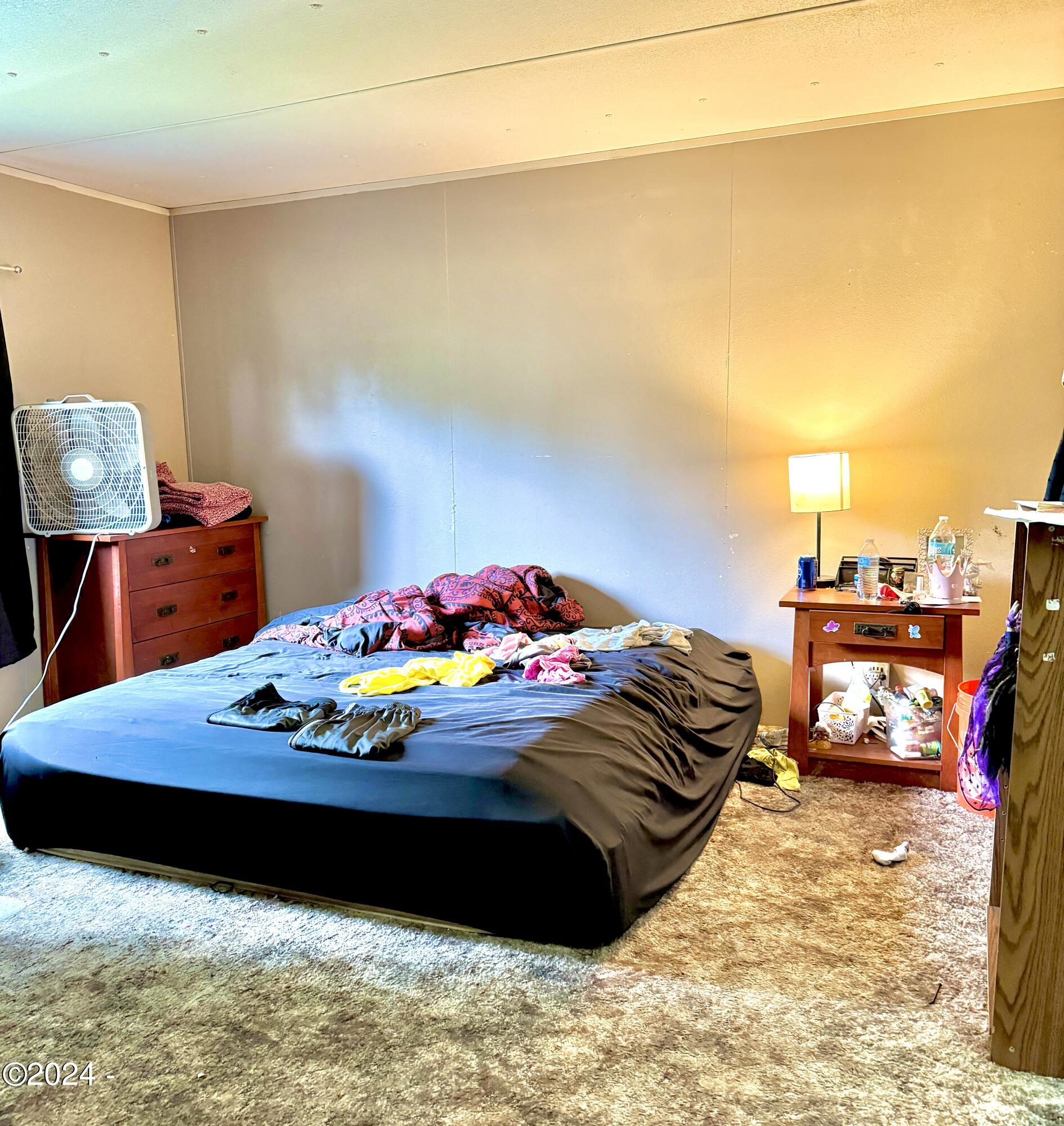 724 Southwest Ferry Avenue, Unit 73 Siletz, OR 97380 - Photo 16 of 24 Bedroom 2