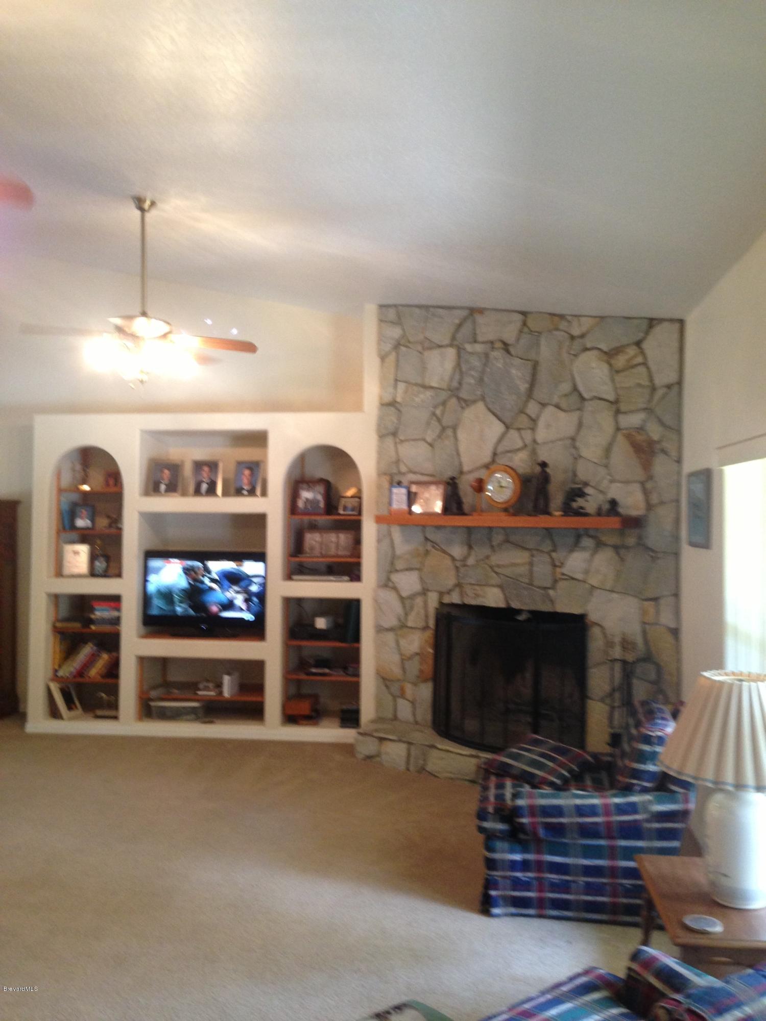 3900 Fenner Road Cocoa, FL 32926 - Photo 2 of 11 Fireplace/Entertainment Center