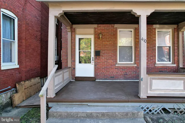 a front view of a house with windows