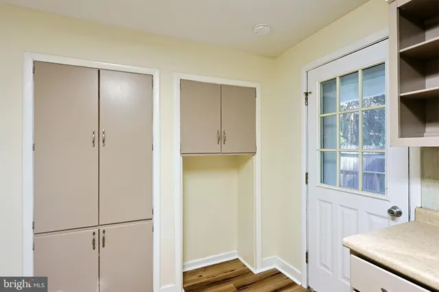 a view of an empty room and window