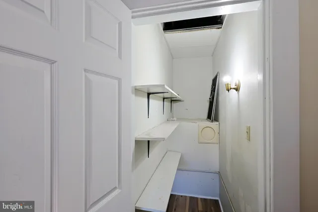 a view of a brick building with many windows