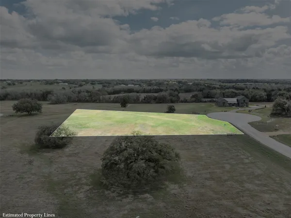 a view of a swimming pool and an outdoor seating
