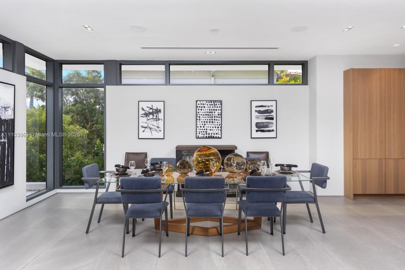 440 Mola Avenue Fort Lauderdale, FL 33301 - Photo 13 of 66 a dining room with furniture and window