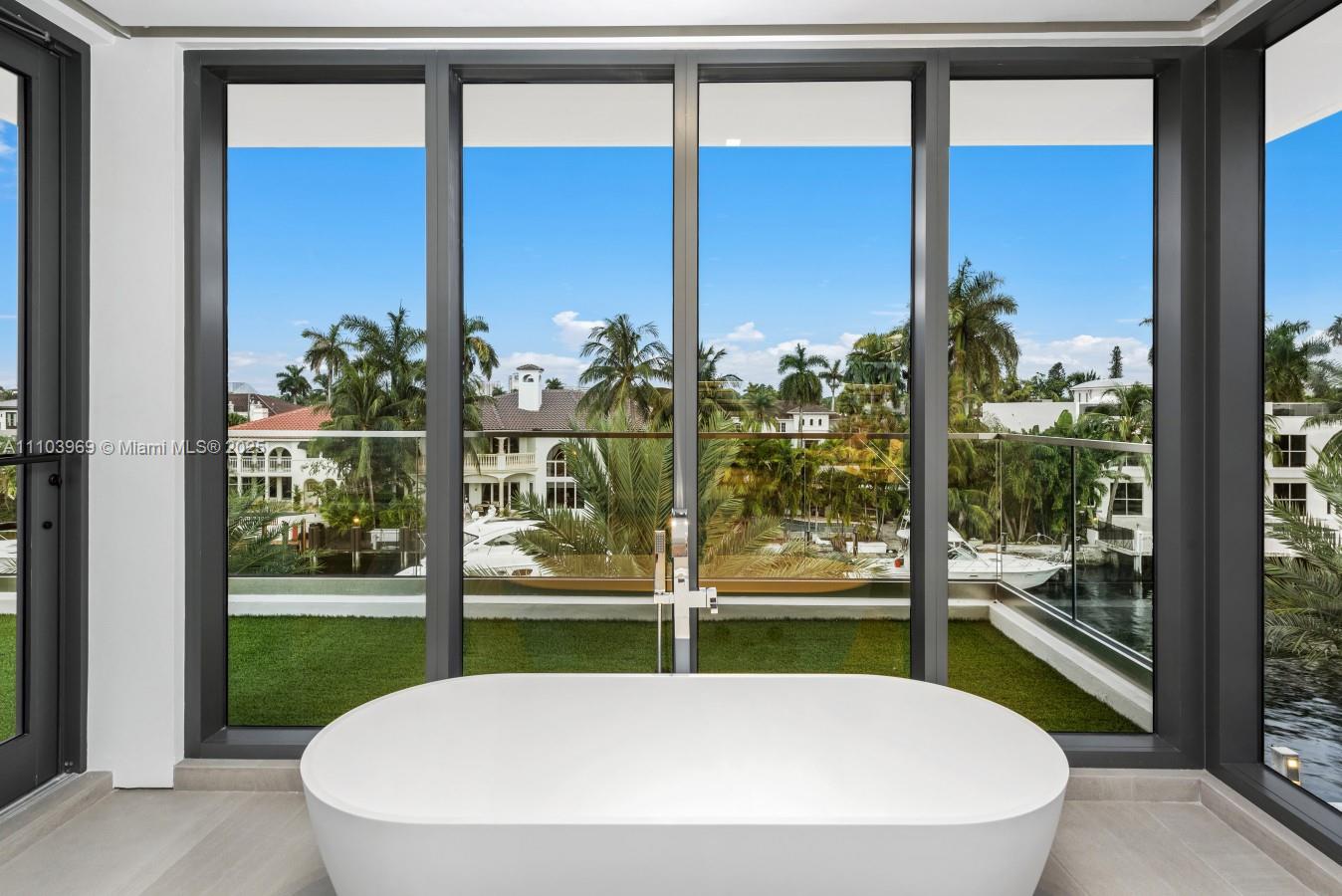 440 Mola Avenue Fort Lauderdale, FL 33301 - Photo 24 of 66 a view of a fountain in front of house