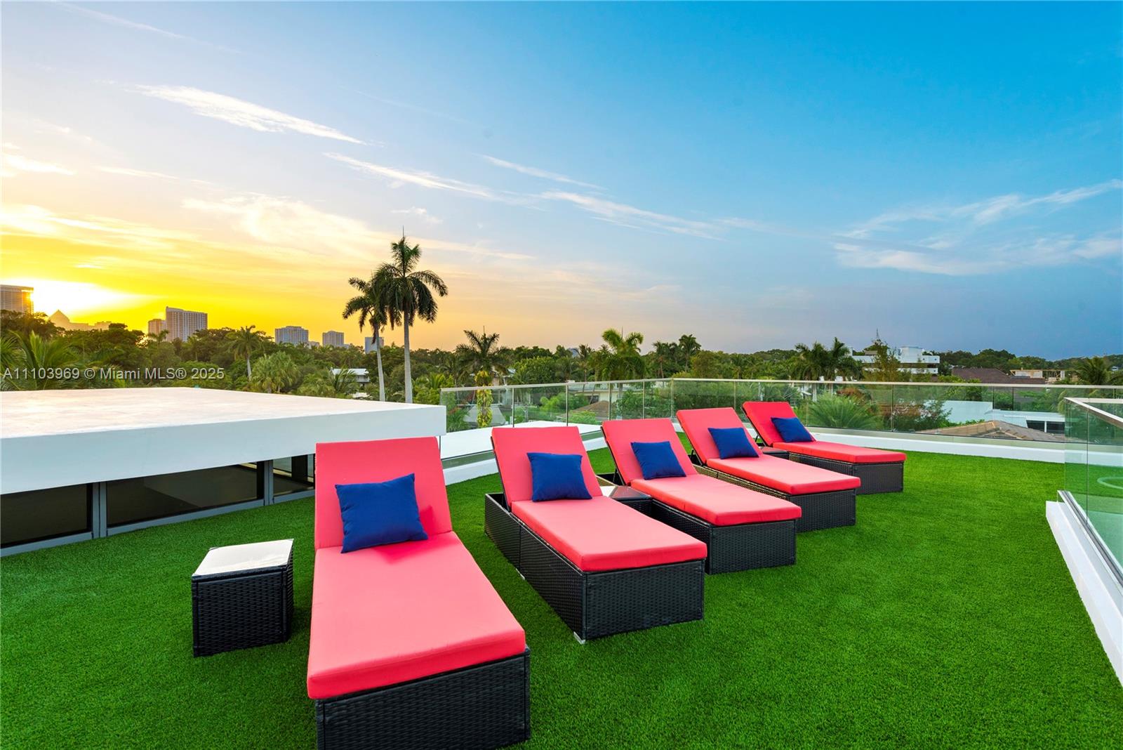 440 Mola Avenue Fort Lauderdale, FL 33301 - Photo 37 of 66 a group of sitting area with swimming pool and green space