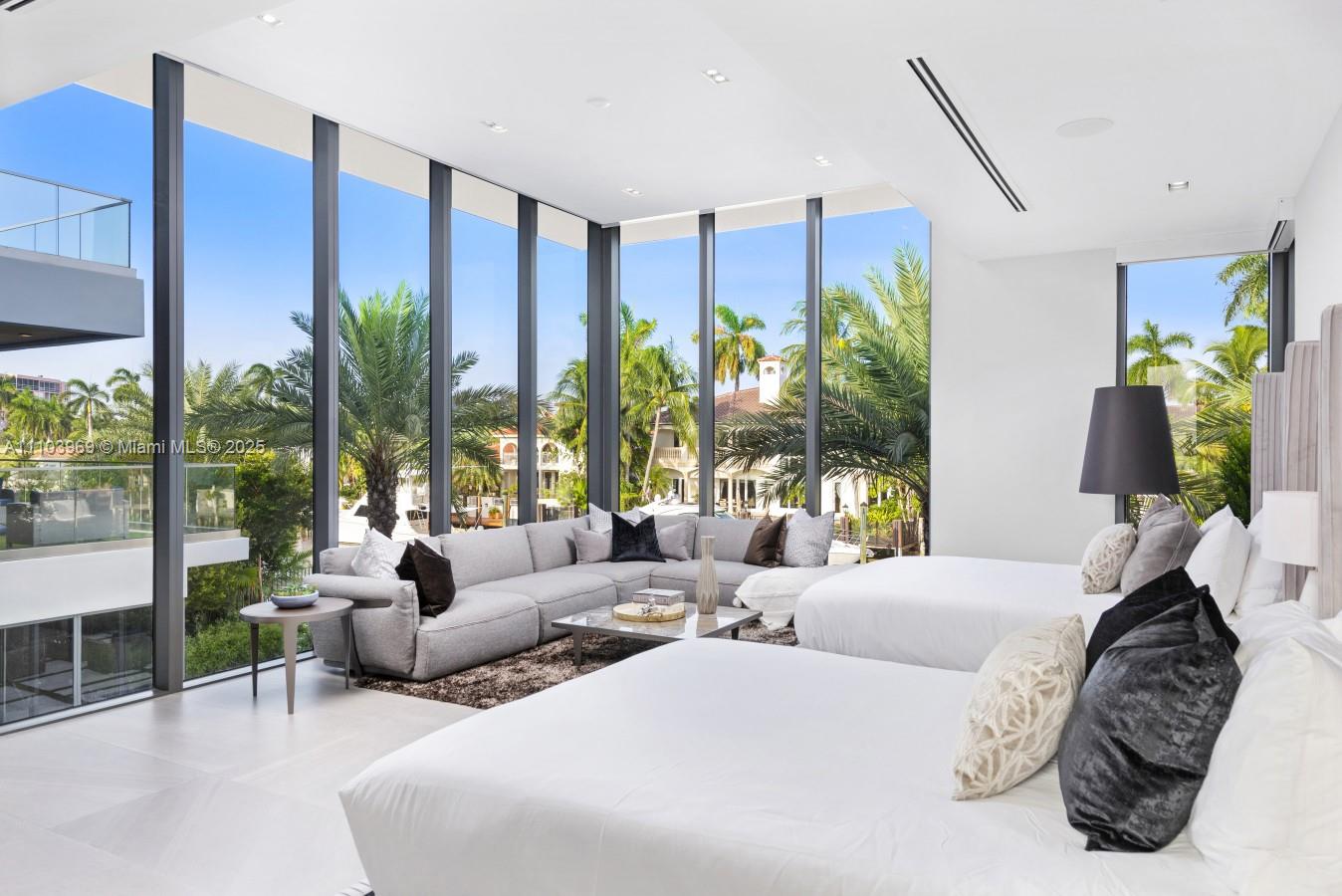 440 Mola Avenue Fort Lauderdale, FL 33301 - Photo 39 of 66 a bedroom with furniture and a large window