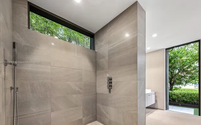 a outdoor living with furniture and a potted plant