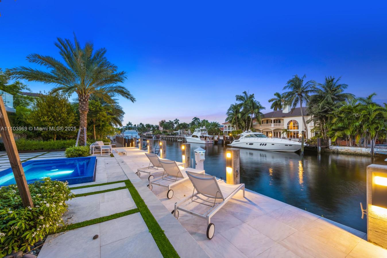 440 Mola Avenue Fort Lauderdale, FL 33301 - Photo 5 of 66 a view of a lake with couches and city view
