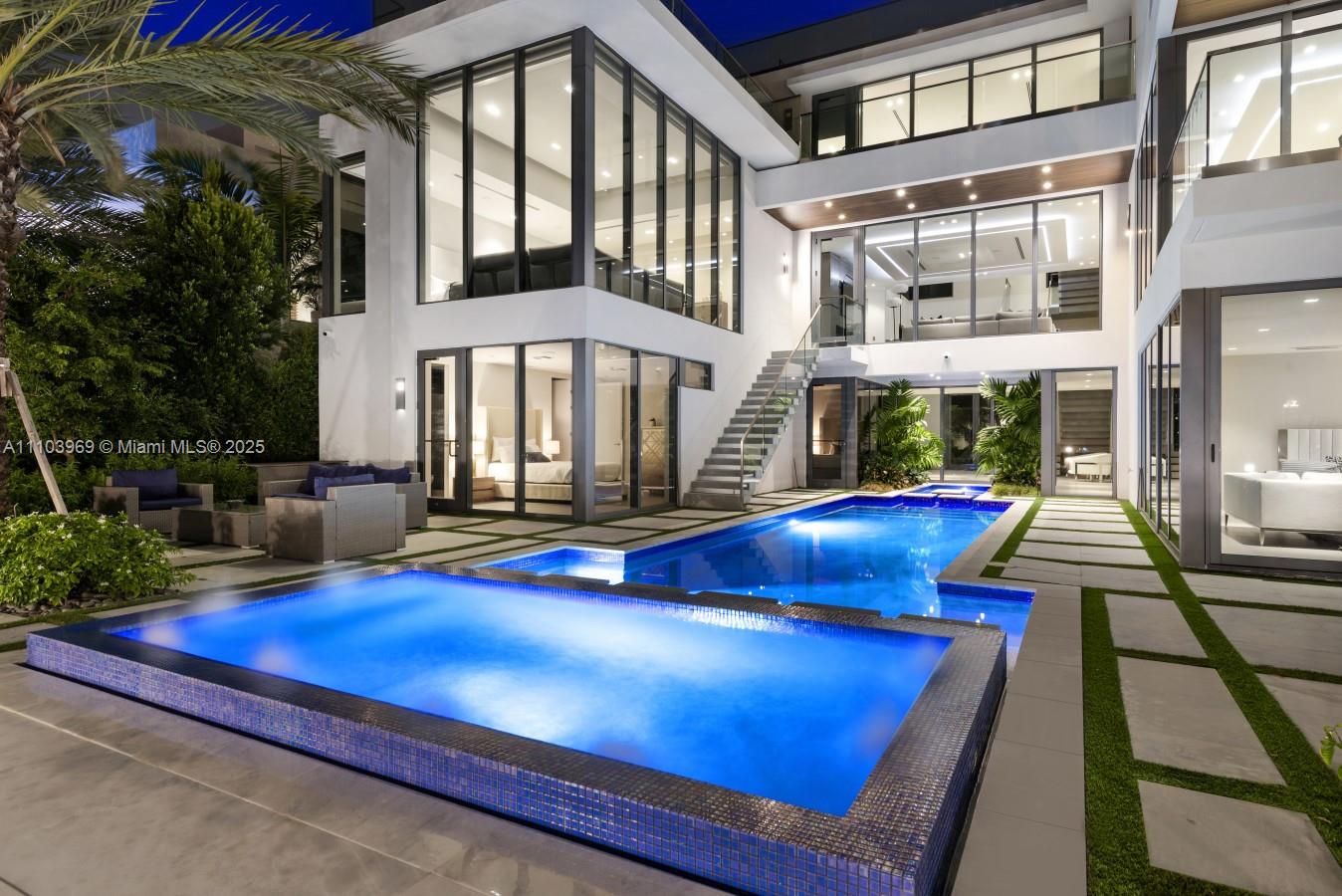 440 Mola Avenue Fort Lauderdale, FL 33301 - Photo 7 of 66 a view of an outdoor space with pool and furniture