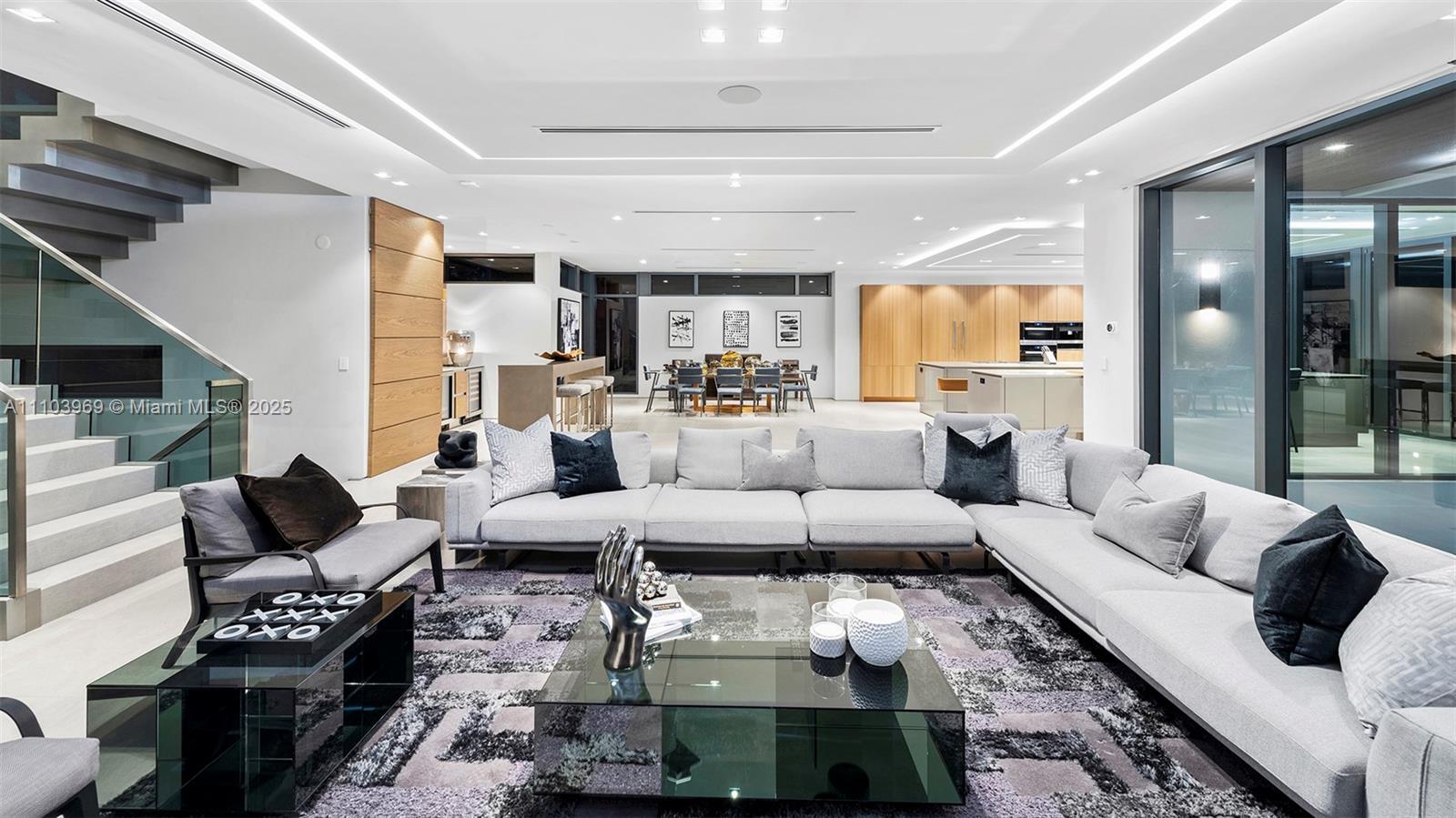 440 Mola Avenue Fort Lauderdale, FL 33301 - Photo 8 of 66 a living room with furniture wooden floor and large window