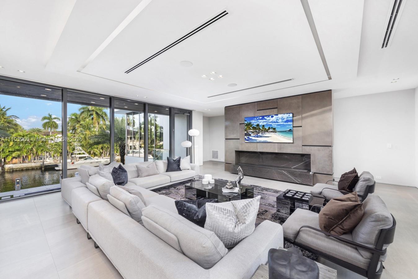 440 Mola Avenue Fort Lauderdale, FL 33301 - Photo 10 of 66 a living room with furniture and a large window