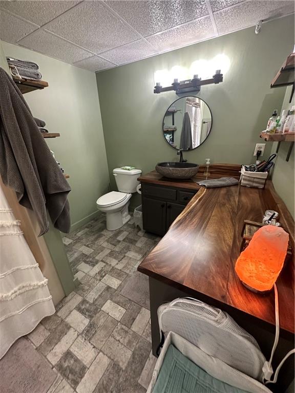600 County Road 531, Unit 206 Centre, AL 35960 - Photo 33 of 36 a bathroom with a toilet mirror and vanity