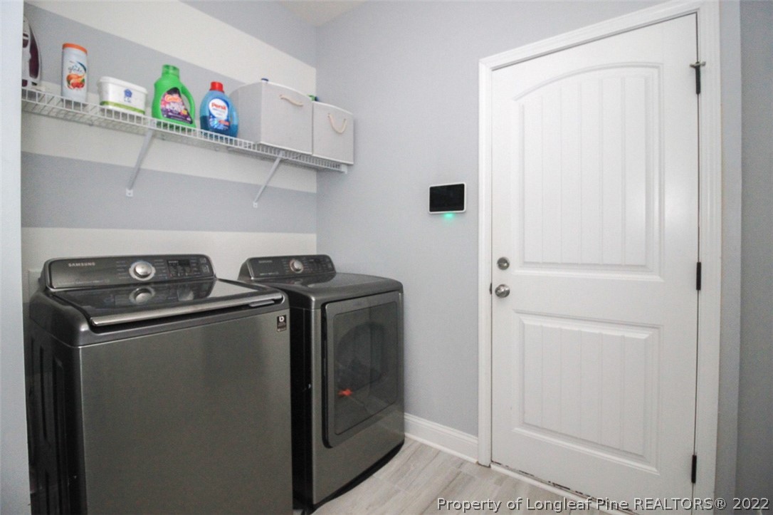 3549 Thrower Road Hope Mills, NC 28348 - Photo 16 of 38 a utility room with dryer and washer
