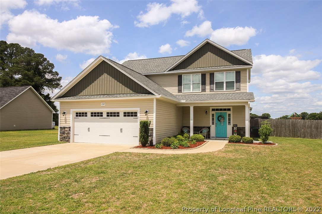 3549 Thrower Road Hope Mills, NC 28348 - Photo 2 of 38 a front view of a house with a yard