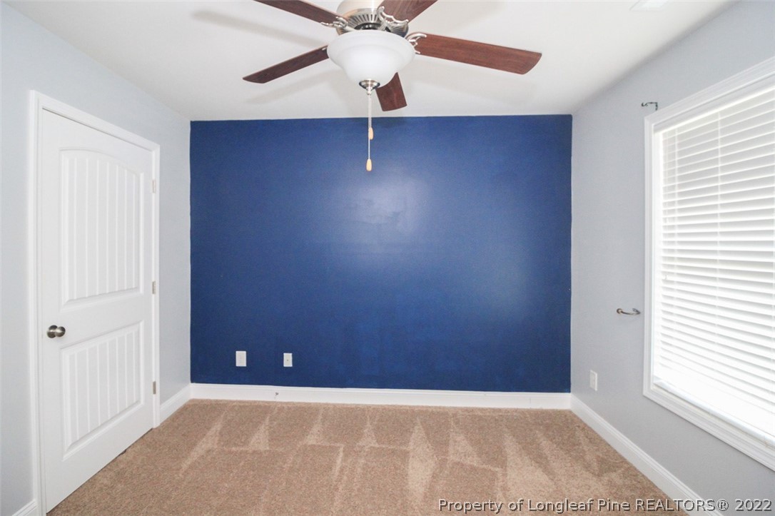 3549 Thrower Road Hope Mills, NC 28348 - Photo 28 of 38 an empty room with windows and fan
