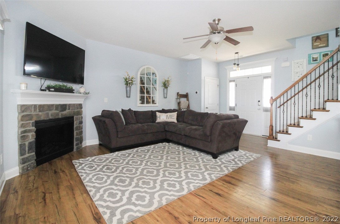 3549 Thrower Road Hope Mills, NC 28348 - Photo 4 of 38 a living room with furniture and a flat screen tv