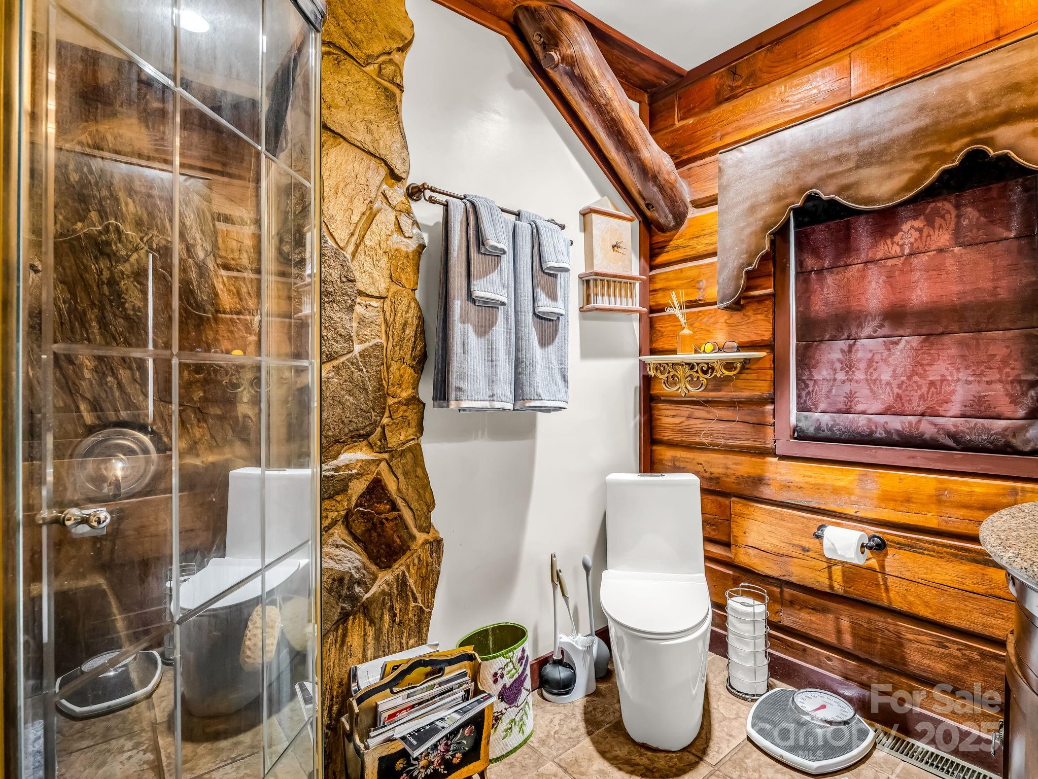 1002 C C Road Rutherfordton, NC 28139 - Photo 16 of 48 a bathroom with a toilet and a shower