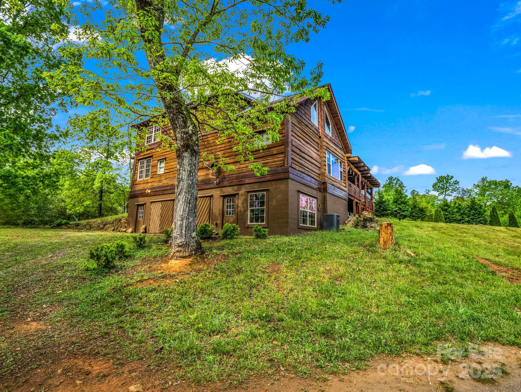 1002 C C Road Rutherfordton, NC 28139 - Photo 2 of 48 a brick building with a yard in front of it