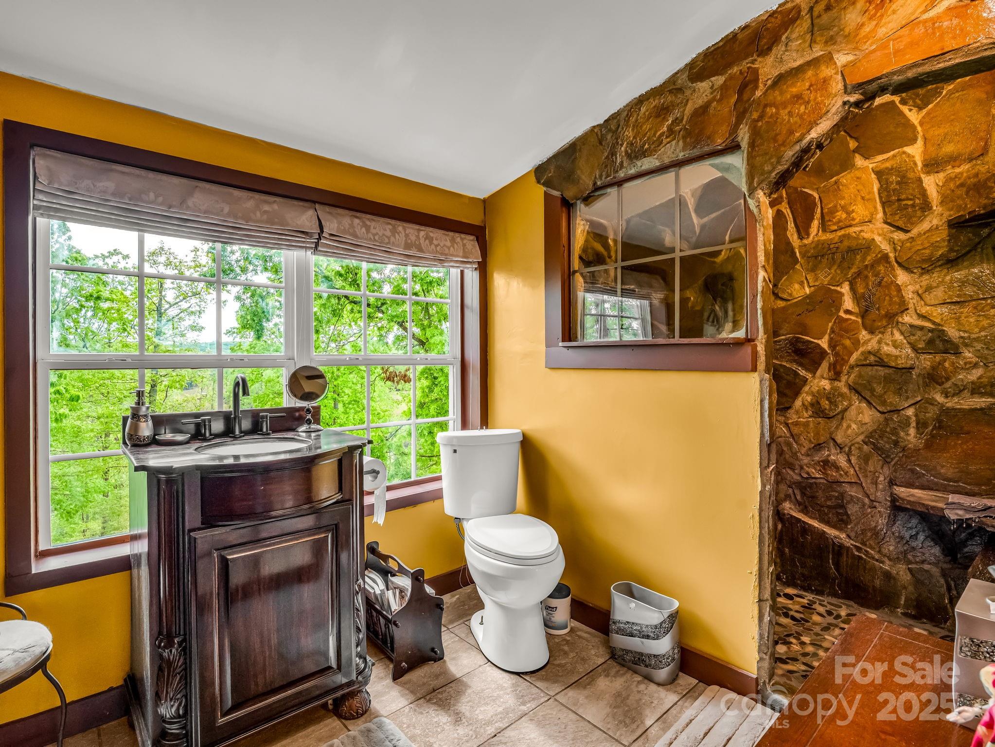 1002 C C Road Rutherfordton, NC 28139 - Photo 21 of 48 a living room with furniture and a floor to ceiling window