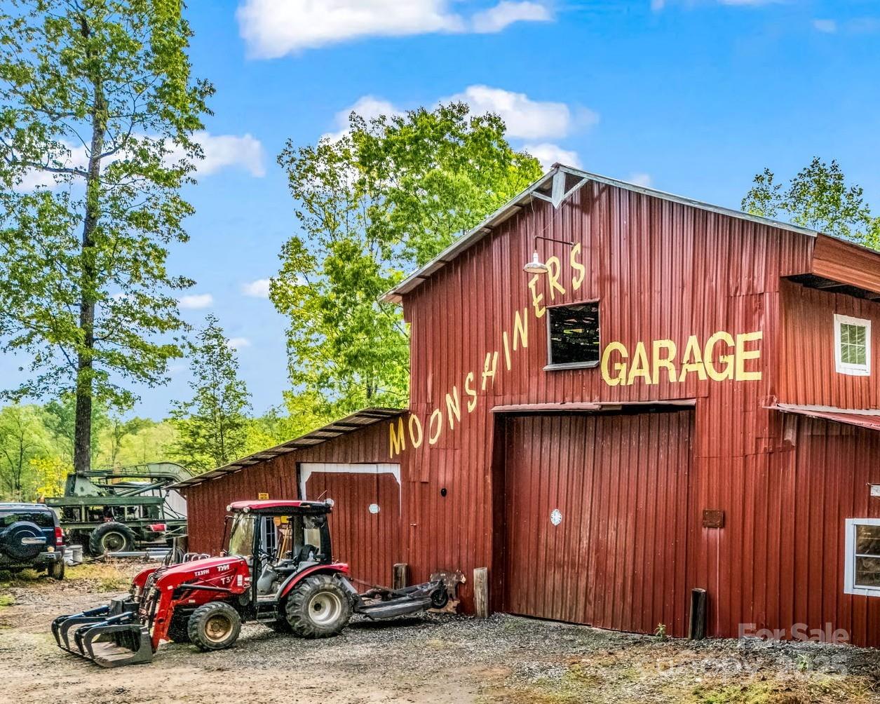 1002 C C Road Rutherfordton, NC 28139 - Photo 44 of 48 a car parked in front of a house