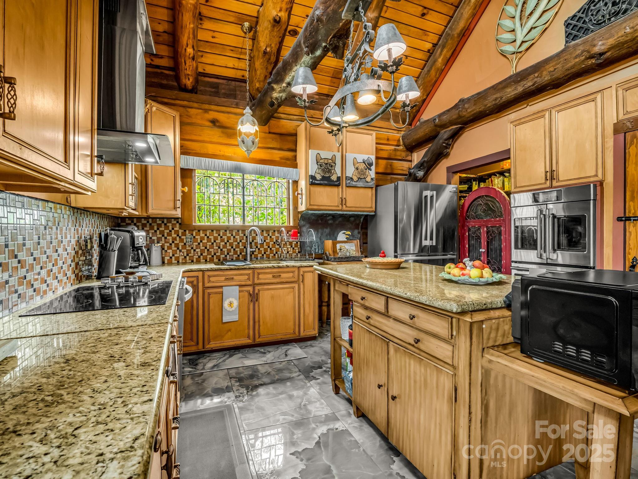 1002 C C Road Rutherfordton, NC 28139 - Photo 8 of 48 a view of a kitchen with a sink and cabinets