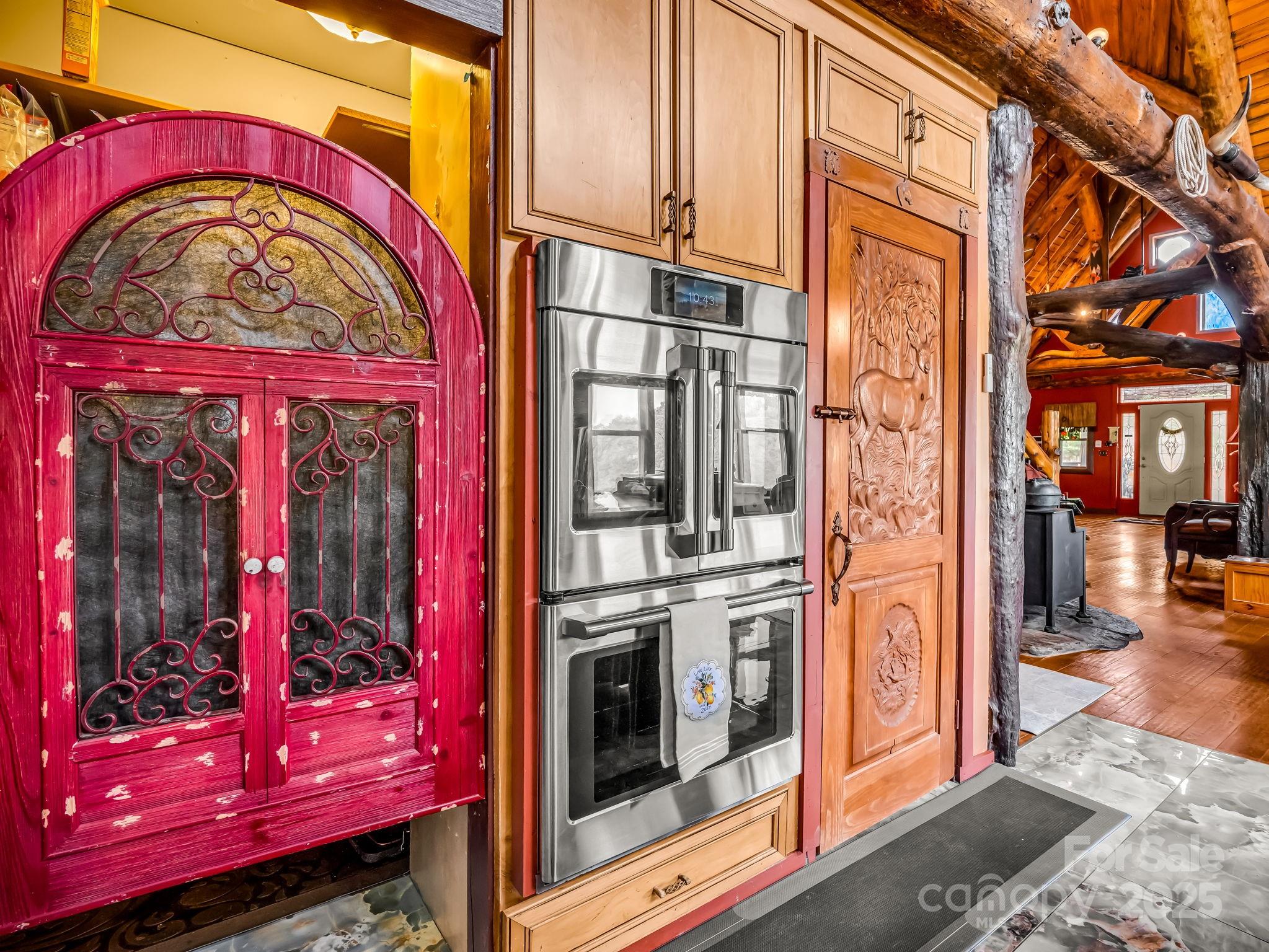 1002 C C Road Rutherfordton, NC 28139 - Photo 9 of 48 a view of a brick building with a red door and a large window