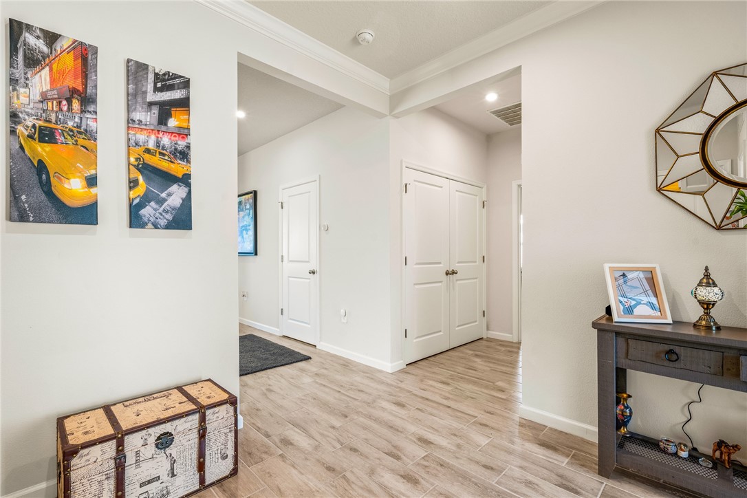 4202 Keeson Circle Vero Beach, FL 32967 - Photo 16 of 36 a view of an entryway with wooden floor