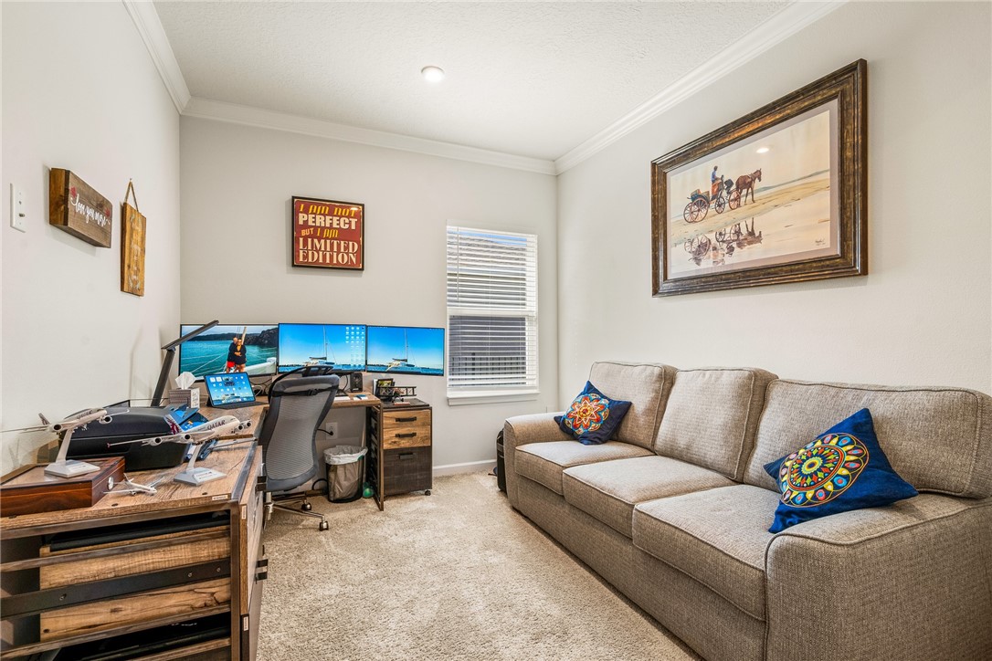 4202 Keeson Circle Vero Beach, FL 32967 - Photo 17 of 36 a living room with furniture and a flat screen tv