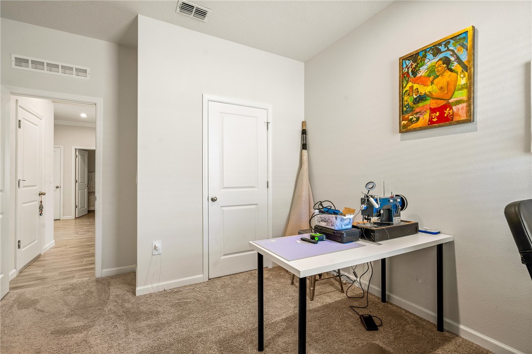 4202 Keeson Circle Vero Beach, FL 32967 - Photo 22 of 36 a view of a workspace with furniture