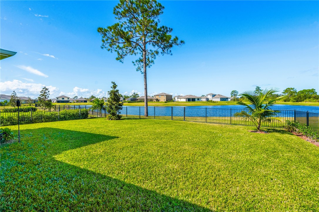 4202 Keeson Circle Vero Beach, FL 32967 - Photo 32 of 36 a view of a garden with a house
