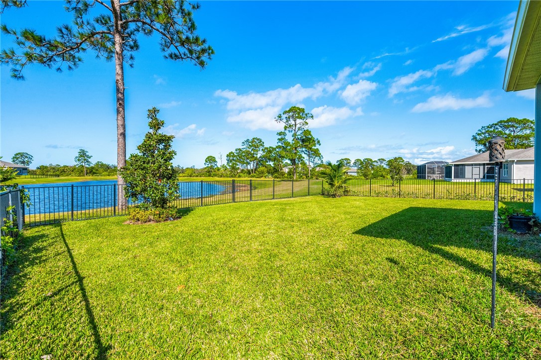 4202 Keeson Circle Vero Beach, FL 32967 - Photo 33 of 36 a view of a house with a big yard