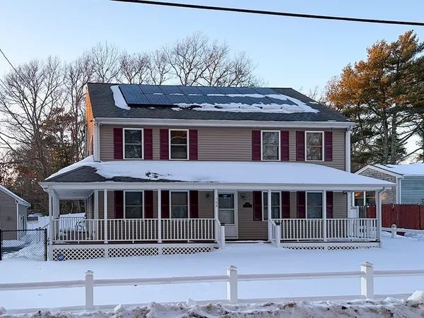 a front view of a house with a porch