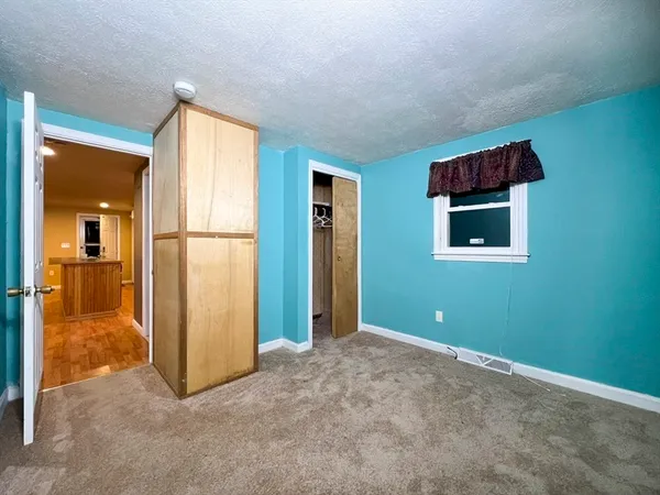 an empty room with painted walls