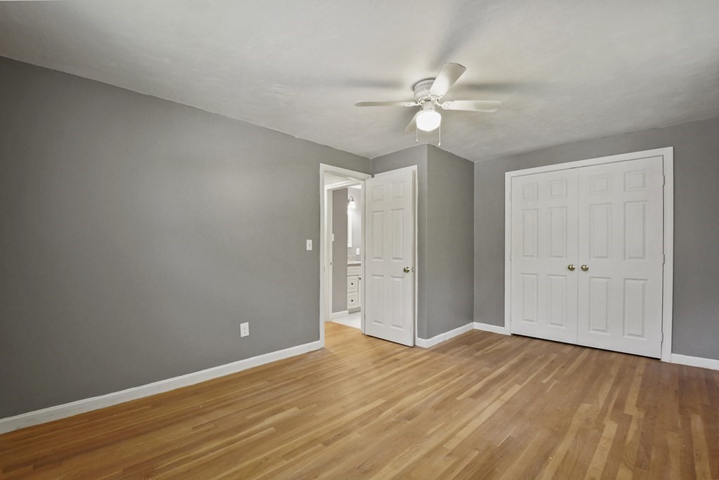 40 Orton Street Worcester, MA 01604 - Photo 12 of 28 a view of a room with wooden floor and fan in it