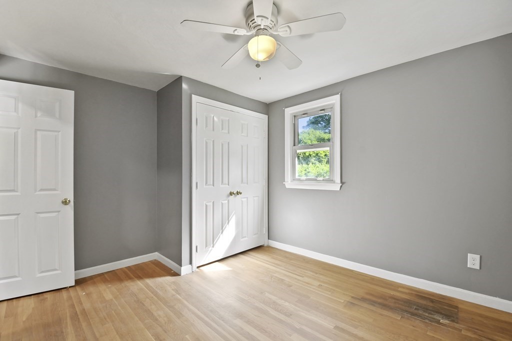 40 Orton Street Worcester, MA 01604 - Photo 19 of 28 a view of an empty room with window and wooden floor