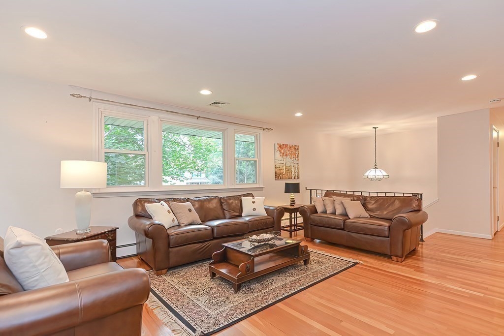 8 Raleigh Road Framingham, MA 01701 - Photo 8 of 32 a living room with furniture and a large window
