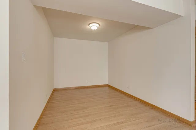 a view of a big room with wooden floor