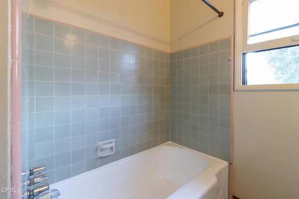 a bathroom with a bathtub