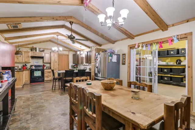 a view of a dining room with furniture