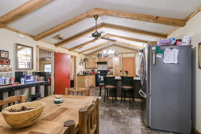 a view of a dining room with furniture